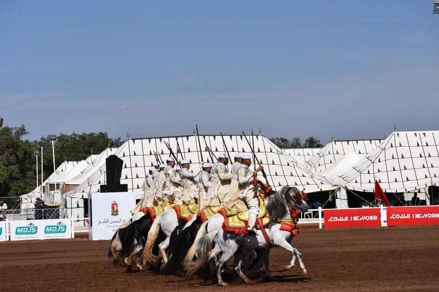 Tbourida fantasia print — Moroccan horsemen charging through gunpowder smoke (BWK-017), photograph by Saida