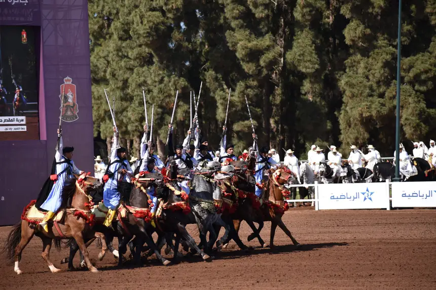 Tbourida fantasia print — Moroccan horsemen charging through gunpowder smoke (BWK-022), photograph by Saida