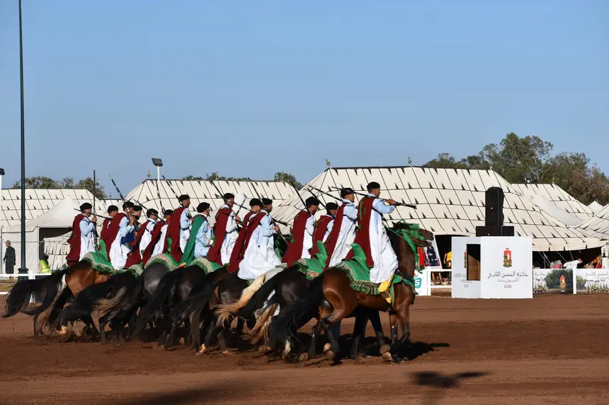 Tbourida fantasia print — Moroccan horsemen charging through gunpowder smoke (BWK-031), photograph by Saida