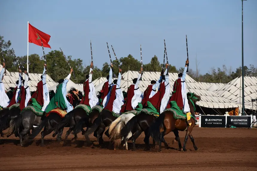 Tbourida fantasia print — Moroccan horsemen charging through gunpowder smoke (BWK-032), photograph by Saida