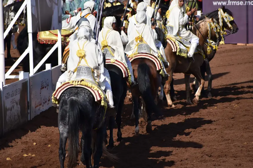 Tbourida fantasia print — Moroccan horsemen charging through gunpowder smoke (BWK-042), photograph by Saida