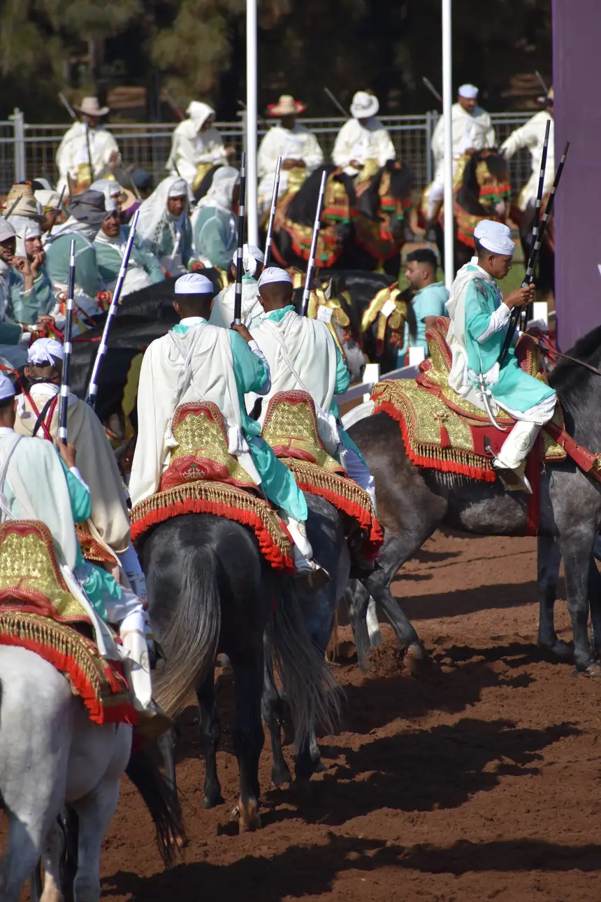 Tbourida fantasia print — Moroccan horsemen charging through gunpowder smoke (BWK-046), photograph by Saida