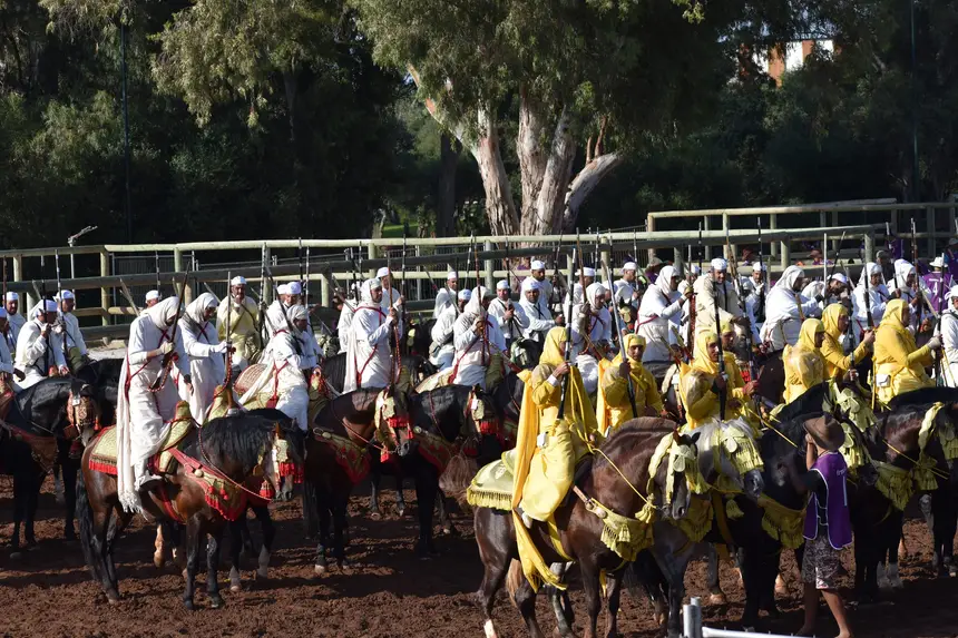 Tbourida fantasia print — Moroccan horsemen charging through gunpowder smoke (BWK-050), photograph by Saida