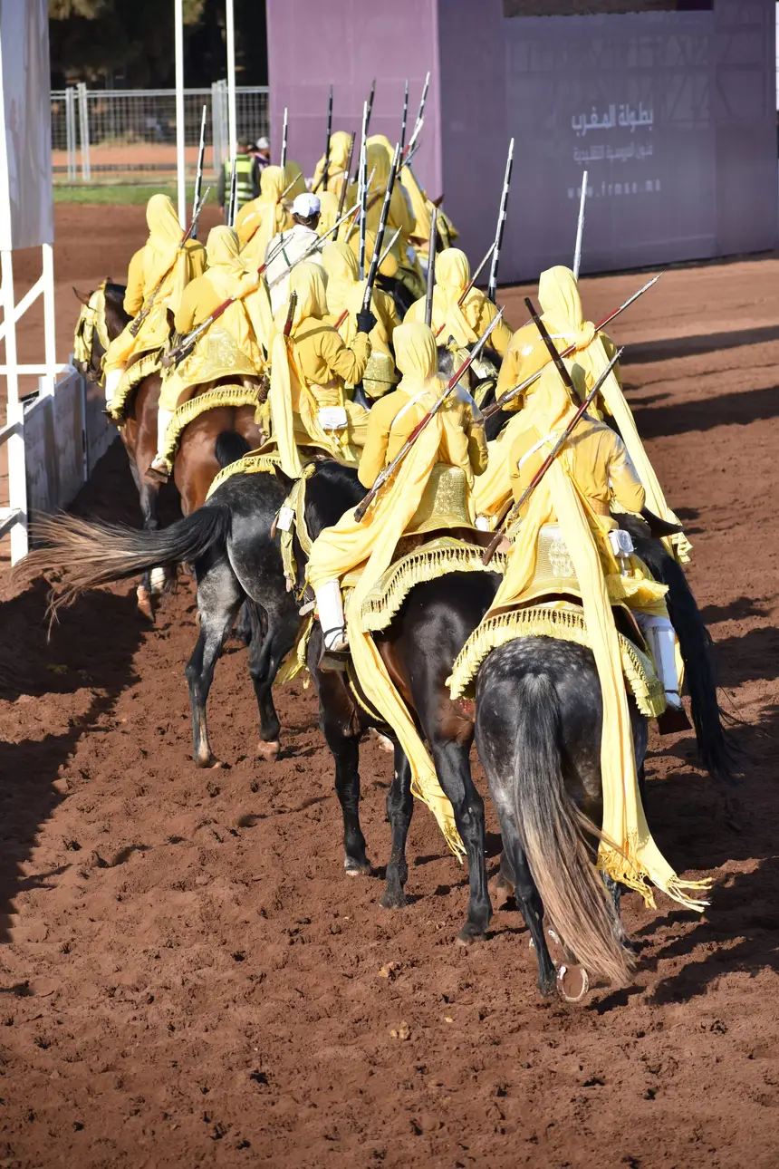 Tbourida fantasia print — Moroccan horsemen charging through gunpowder smoke (BWK-053), photograph by Saida