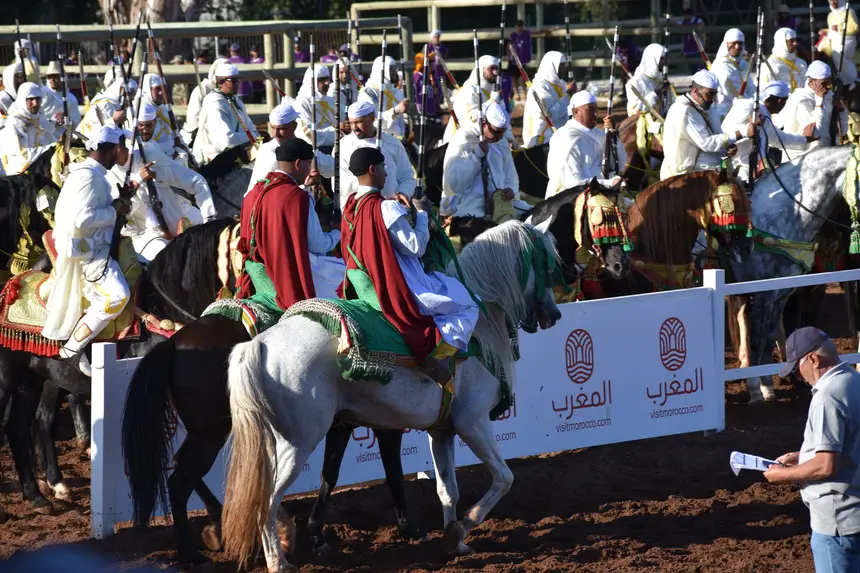 Tbourida fantasia print — Moroccan horsemen charging through gunpowder smoke (BWK-085), photograph by Saida