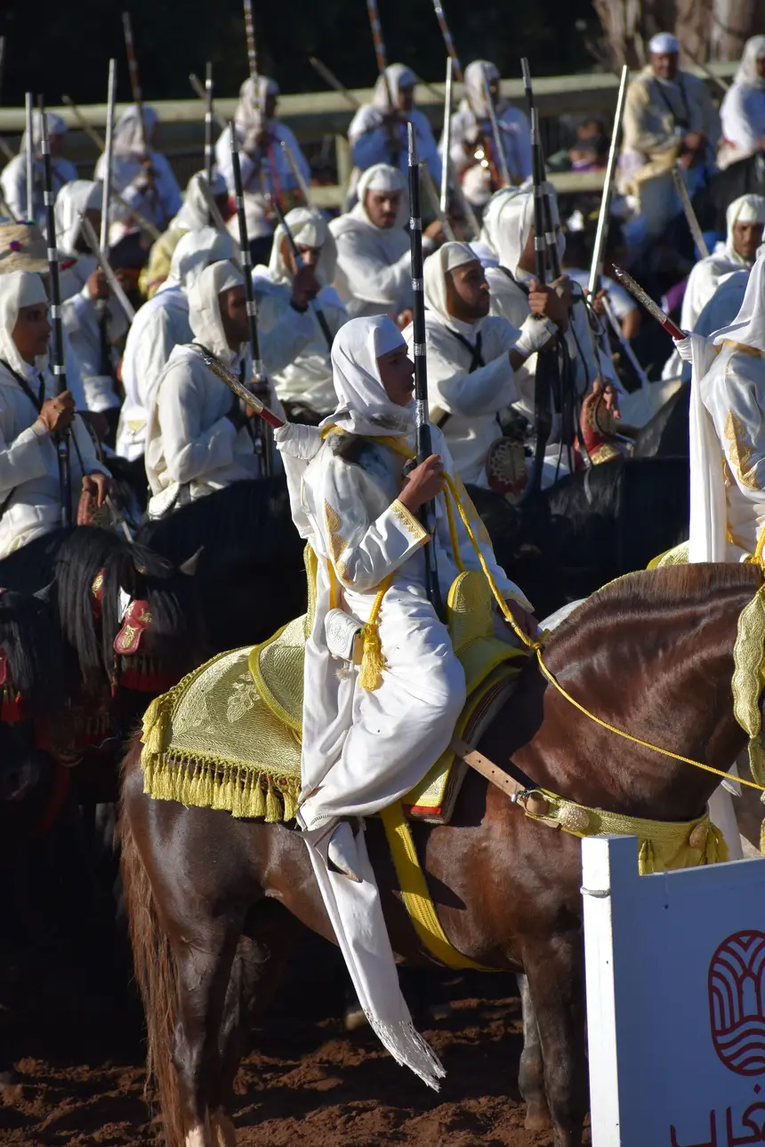 Tbourida fantasia print — Moroccan horsemen charging through gunpowder smoke (BWK-106), photograph by Saida