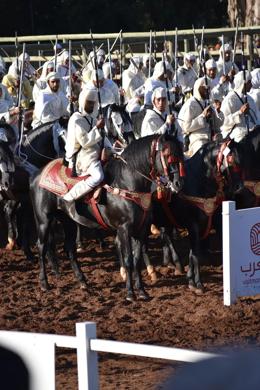 Tbourida fantasia print — Moroccan horsemen charging through gunpowder smoke (BWK-114), photograph by Saida