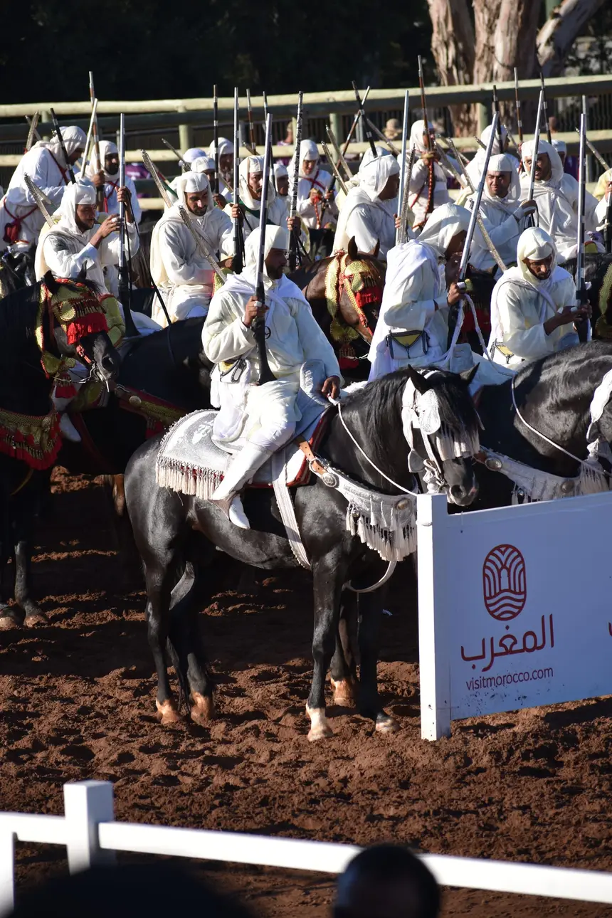 Tbourida fantasia print — Moroccan horsemen charging through gunpowder smoke (BWK-119), photograph by Saida