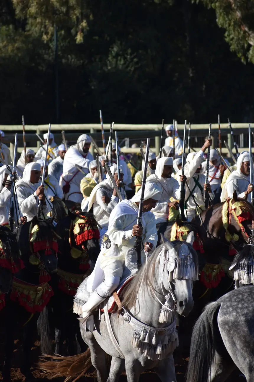 Tbourida fantasia print — Moroccan horsemen charging through gunpowder smoke (BWK-123), photograph by Saida