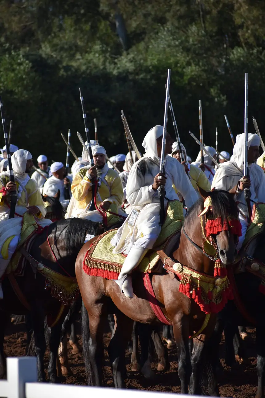 Tbourida fantasia print — Moroccan horsemen charging through gunpowder smoke (BWK-126), photograph by Saida