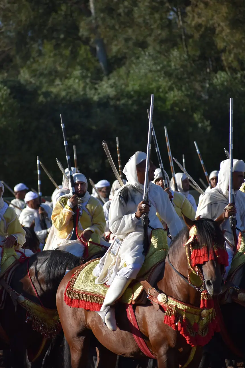 Tbourida fantasia print — Moroccan horsemen charging through gunpowder smoke (BWK-127), photograph by Saida