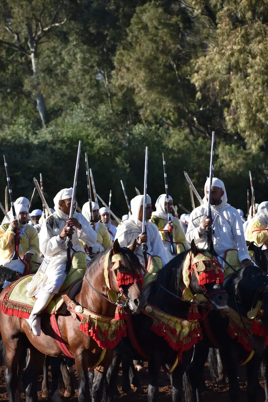 Tbourida fantasia print — Moroccan horsemen charging through gunpowder smoke (BWK-130), photograph by Saida