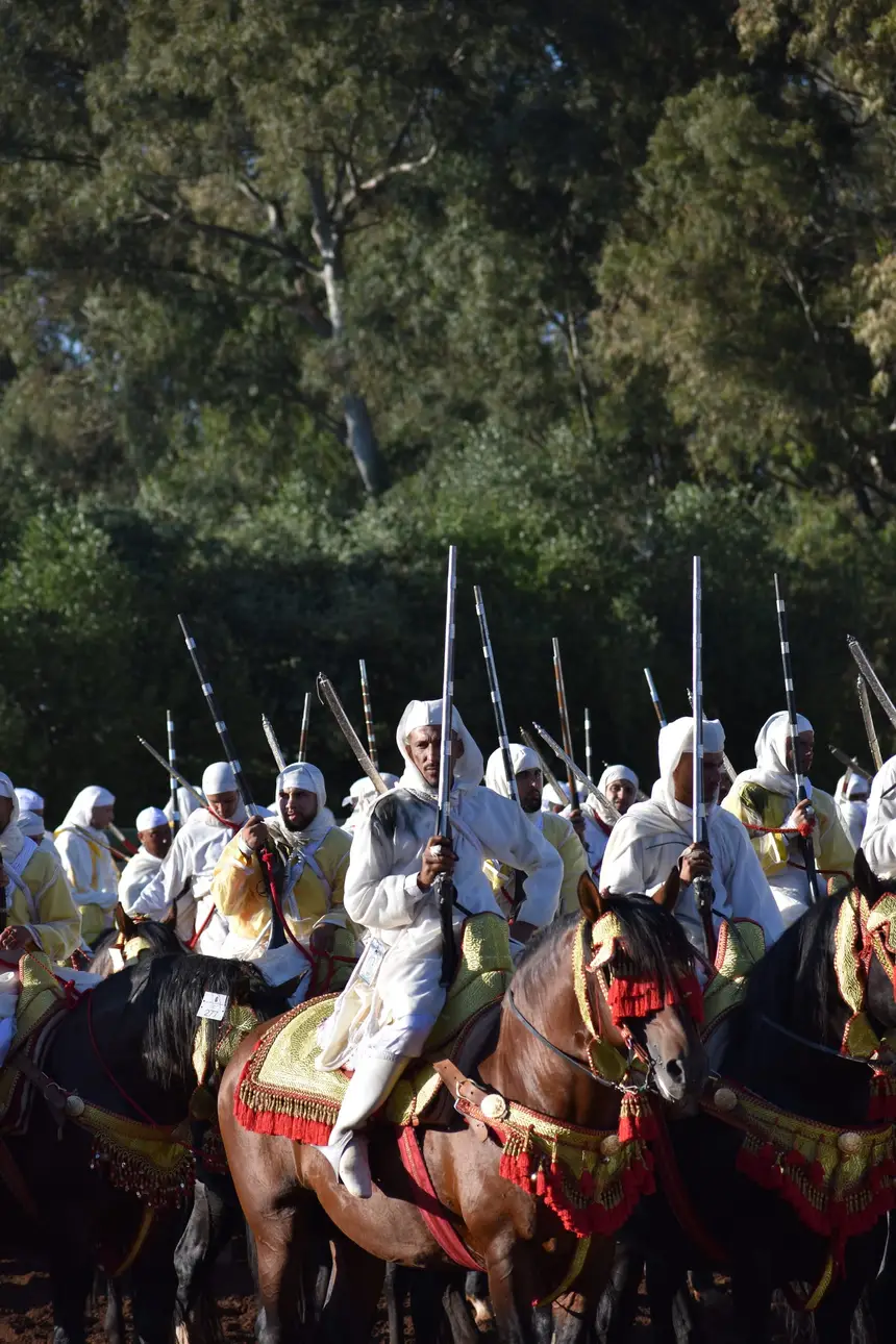 Tbourida fantasia print — Moroccan horsemen charging through gunpowder smoke (BWK-131), photograph by Saida