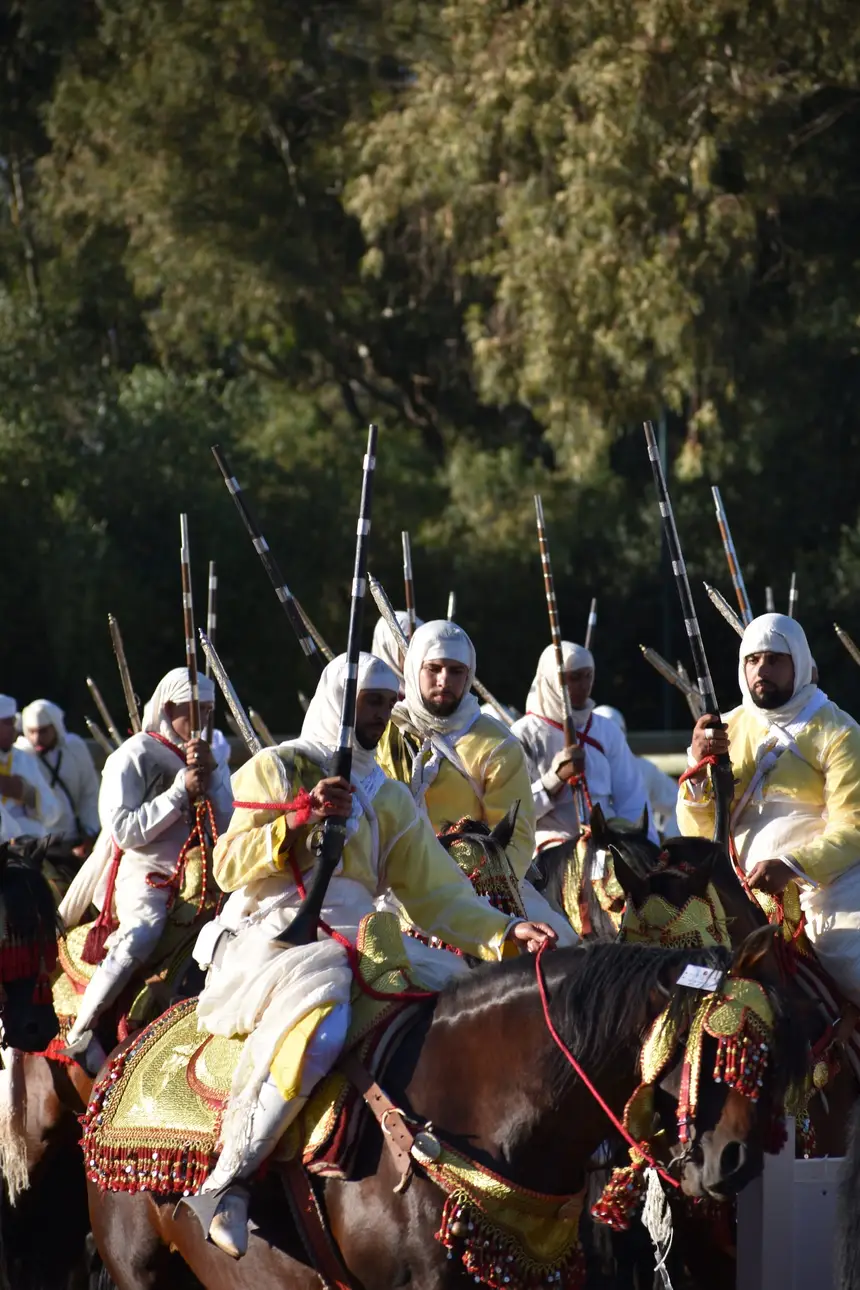 Tbourida fantasia print — Moroccan horsemen charging through gunpowder smoke (BWK-145), photograph by Saida