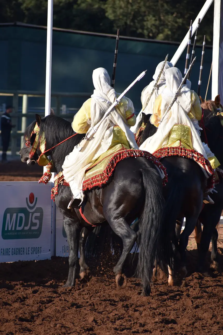 Tbourida fantasia print — Moroccan horsemen charging through gunpowder smoke (BWK-148), photograph by Saida