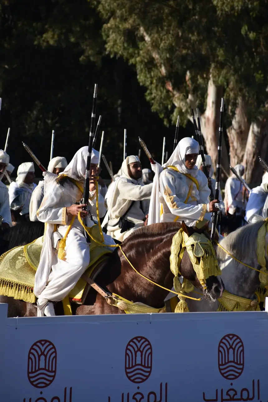 Tbourida fantasia print — Moroccan horsemen charging through gunpowder smoke (BWK-170), photograph by Saida