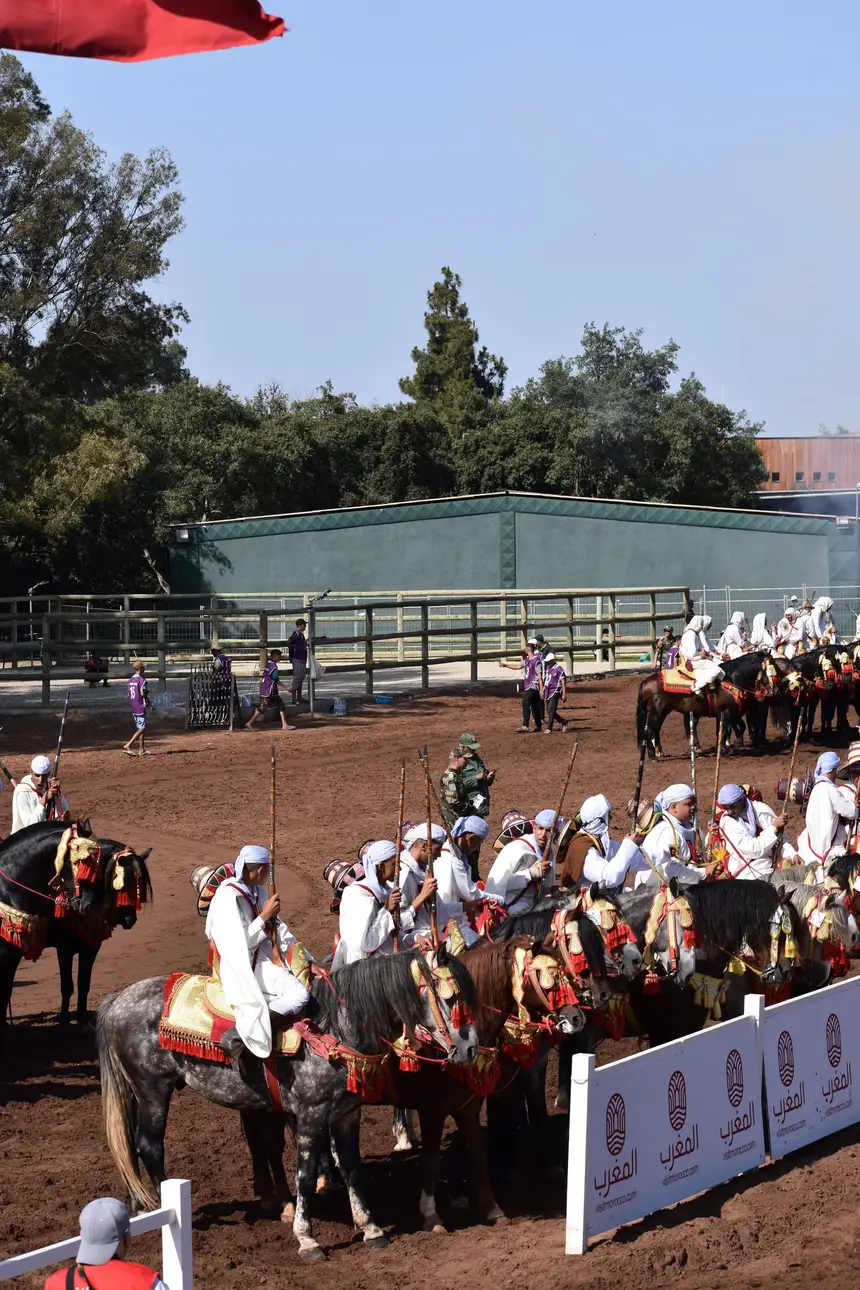 Tbourida fantasia print — Moroccan horsemen charging through gunpowder smoke (BWK-221), photograph by Saida