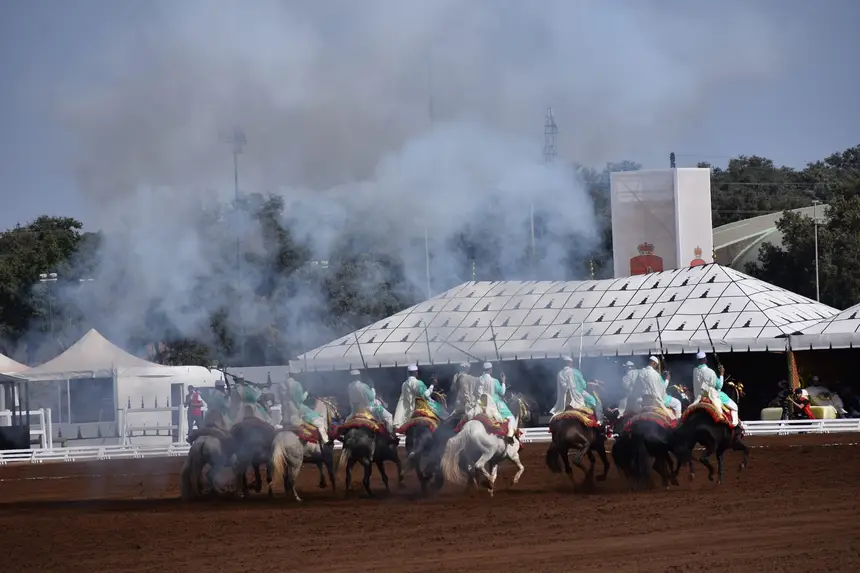 Tbourida fantasia print — Moroccan horsemen charging through gunpowder smoke (BWK-241), photograph by Saida