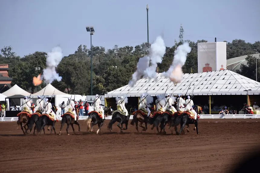 Tbourida fantasia print — Moroccan horsemen charging through gunpowder smoke (BWK-251), photograph by Saida