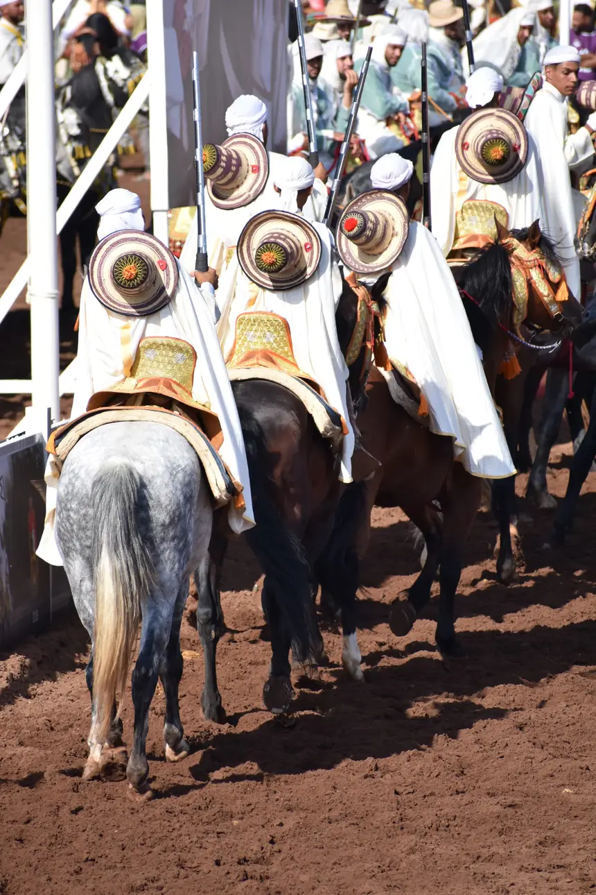 Tbourida fantasia print — Moroccan horsemen charging through gunpowder smoke (BWK-260), photograph by Saida