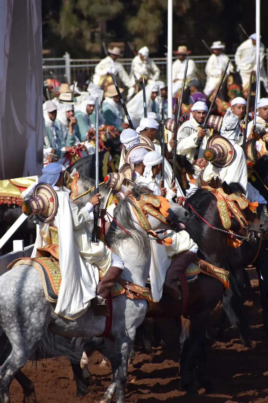 Tbourida fantasia print — Moroccan horsemen charging through gunpowder smoke (BWK-261), photograph by Saida
