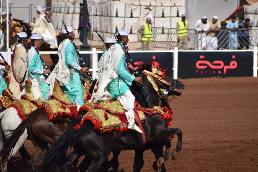 Tbourida fantasia print — Moroccan horsemen charging through gunpowder smoke (BWK-265), photograph by Saida