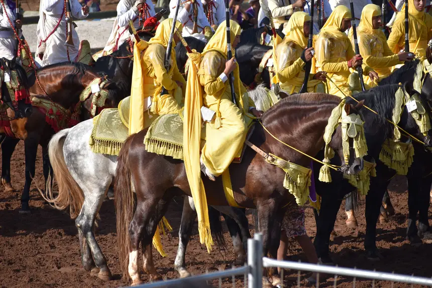 Tbourida fantasia print — Moroccan horsemen charging through gunpowder smoke (BWK-267), photograph by Saida