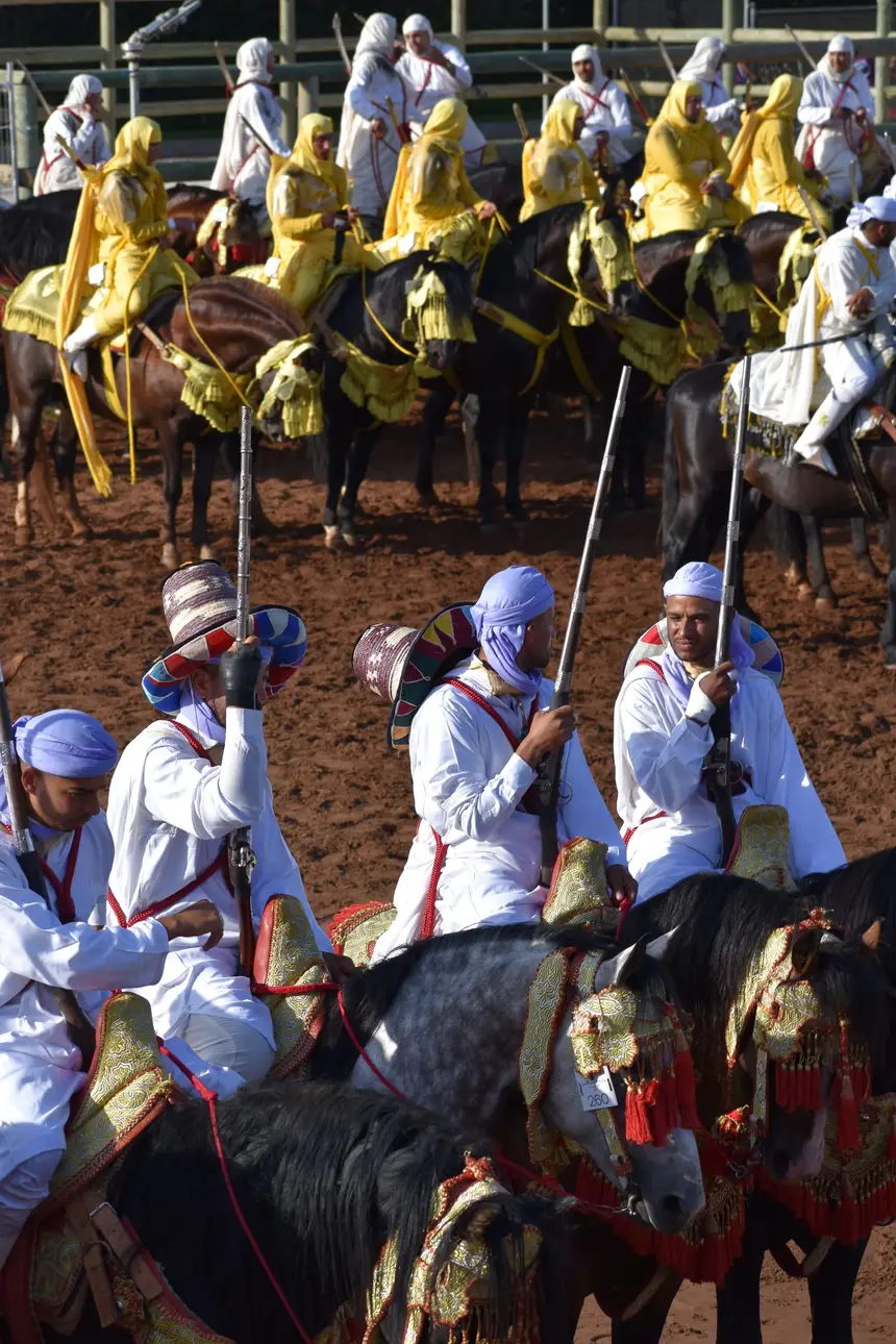Tbourida fantasia print — Moroccan horsemen charging through gunpowder smoke (BWK-287), photograph by Saida