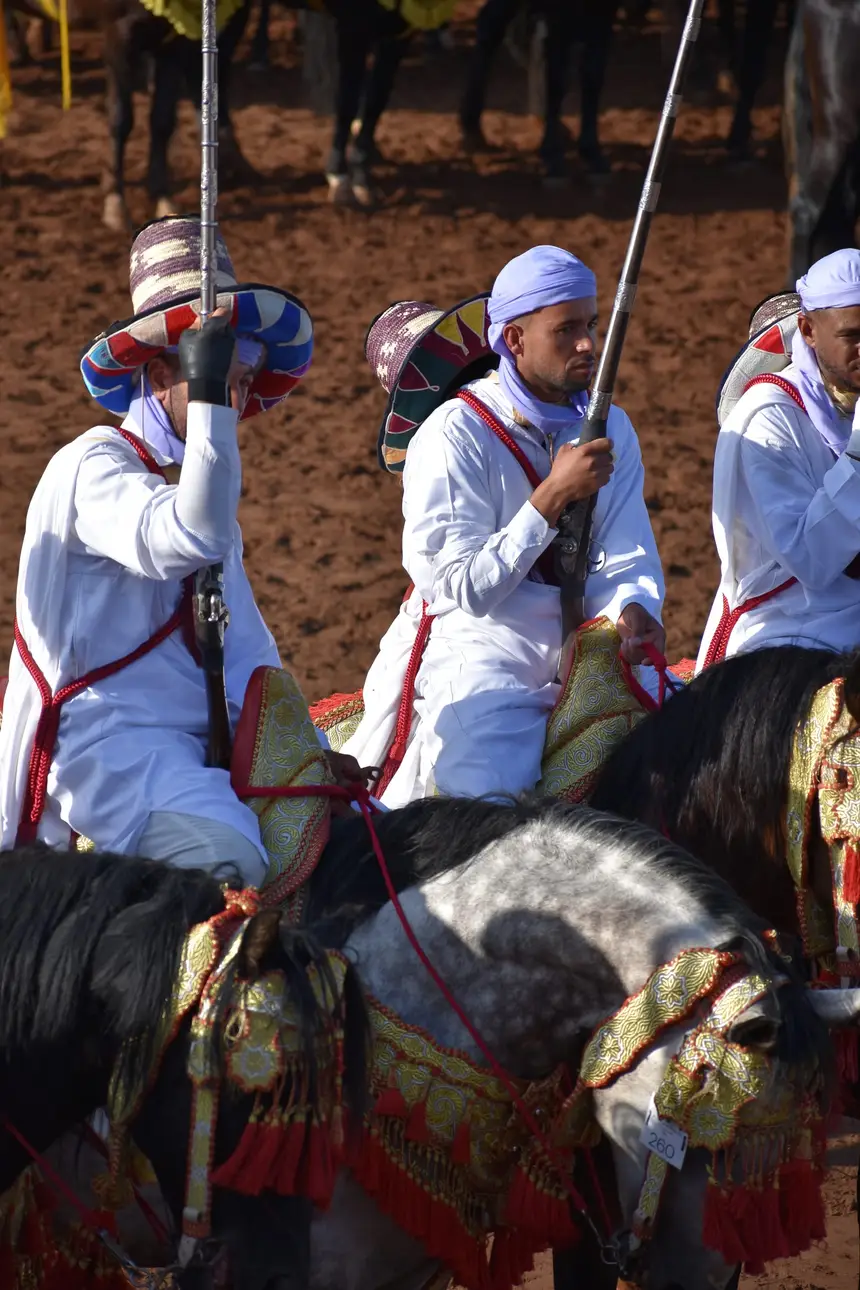 Tbourida fantasia print — Moroccan horsemen charging through gunpowder smoke (BWK-288), photograph by Saida