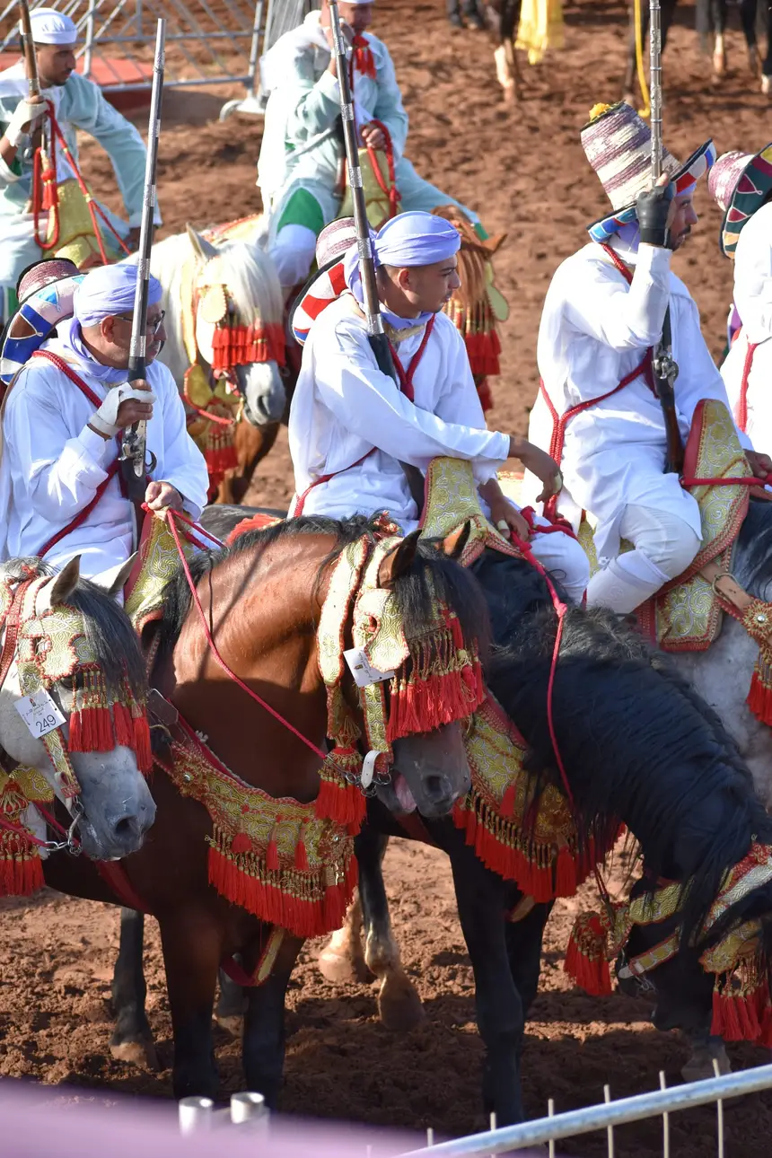 Tbourida fantasia print — Moroccan horsemen charging through gunpowder smoke (BWK-290), photograph by Saida