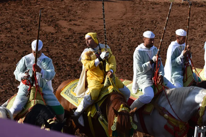 Tbourida fantasia print — Moroccan horsemen charging through gunpowder smoke (BWK-298), photograph by Saida