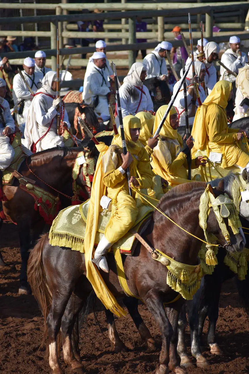 Tbourida fantasia print — Moroccan horsemen charging through gunpowder smoke (BWK-304), photograph by Saida