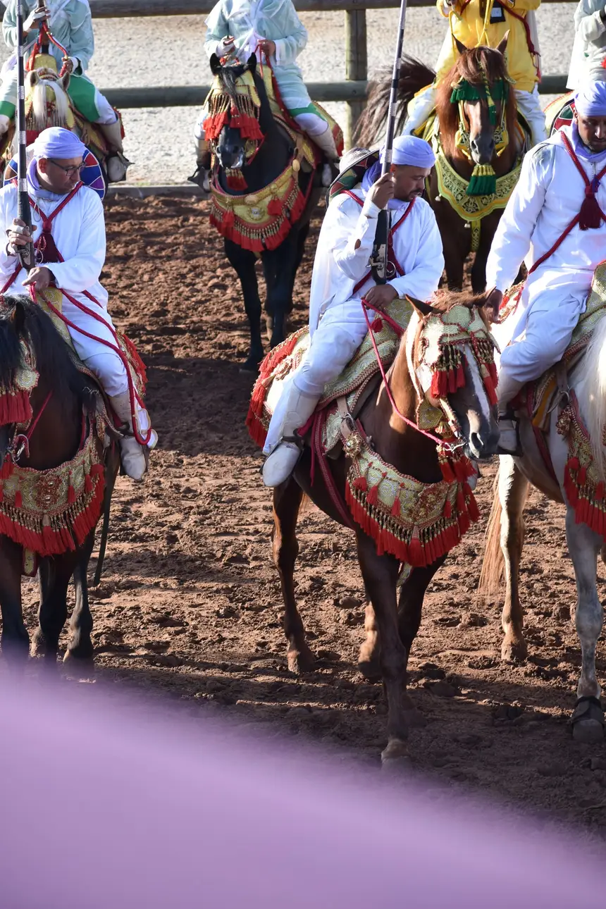 Tbourida fantasia print — Moroccan horsemen charging through gunpowder smoke (BWK-319), photograph by Saida