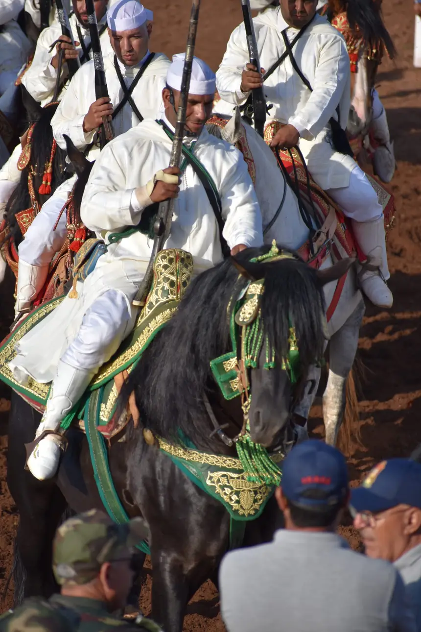 Tbourida fantasia print — Moroccan horsemen charging through gunpowder smoke (BWK-323), photograph by Saida