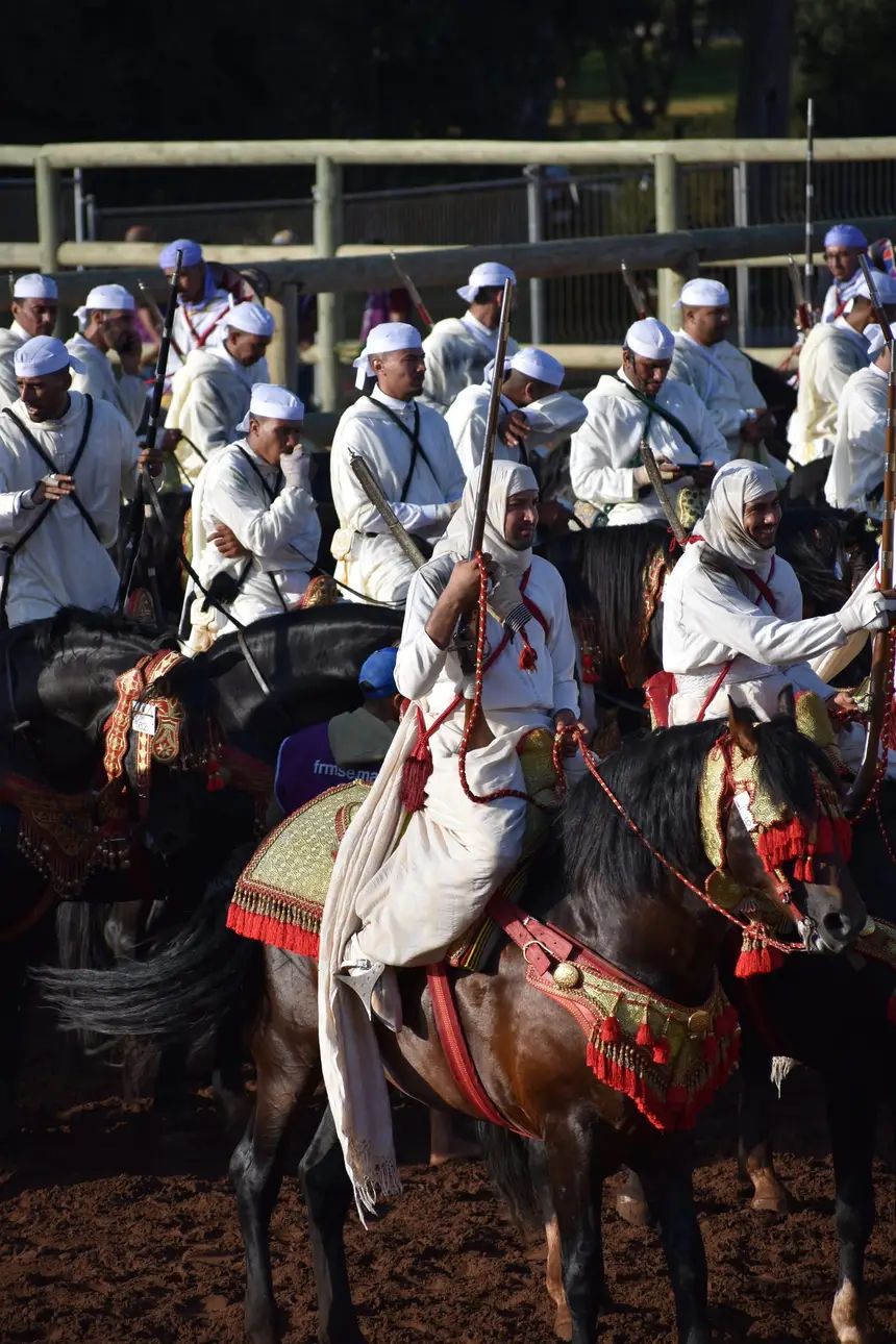 Tbourida fantasia print — Moroccan horsemen charging through gunpowder smoke (BWK-334), photograph by Saida