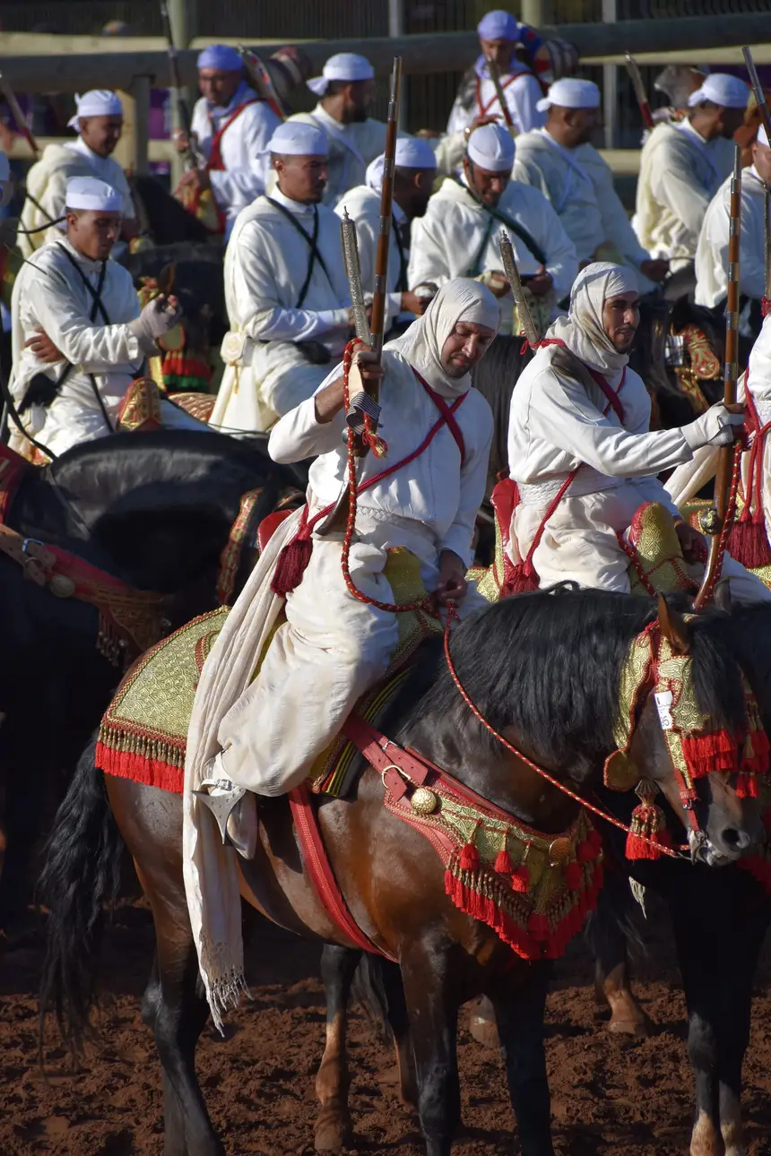 Tbourida fantasia print — Moroccan horsemen charging through gunpowder smoke (BWK-335), photograph by Saida