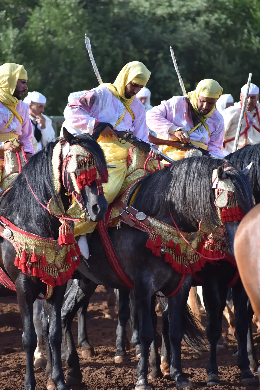 Tbourida fantasia print — Moroccan horsemen charging through gunpowder smoke (BWK-370), photograph by Saida