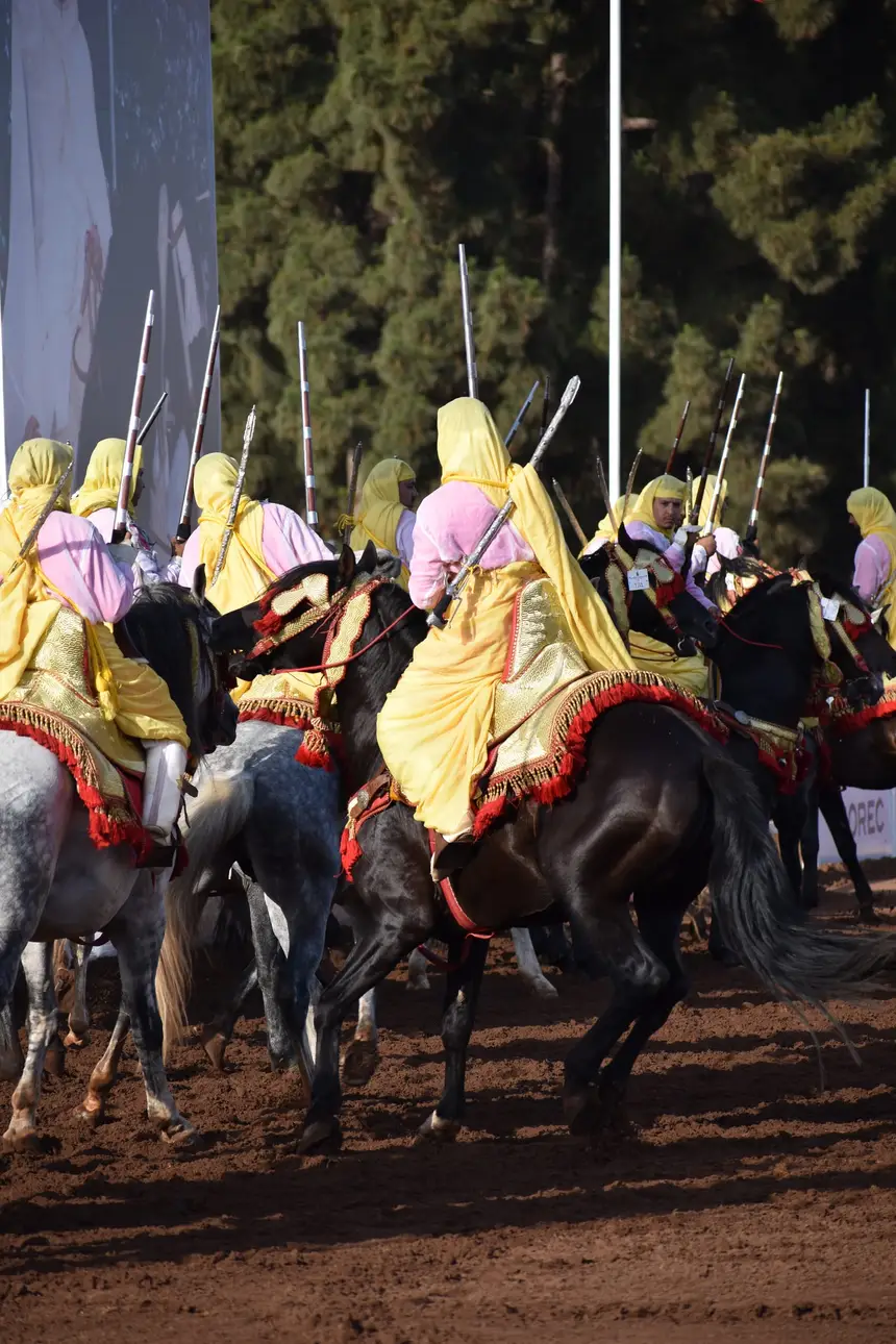 Tbourida fantasia print — Moroccan horsemen charging through gunpowder smoke (BWK-393), photograph by Saida
