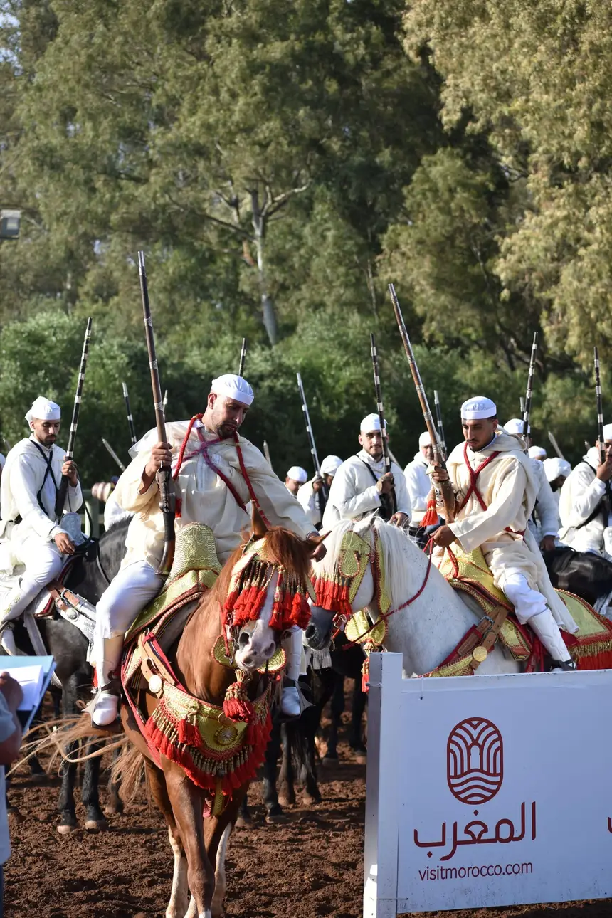 Tbourida fantasia print — Moroccan horsemen charging through gunpowder smoke (BWK-396), photograph by Saida