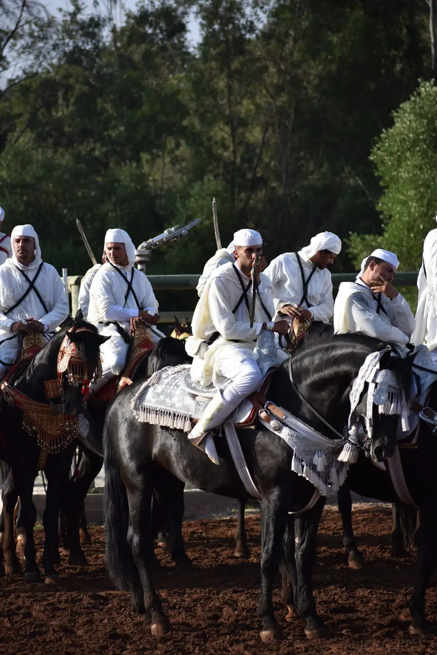 Tbourida fantasia print — Moroccan horsemen charging through gunpowder smoke (BWK-425), photograph by Saida