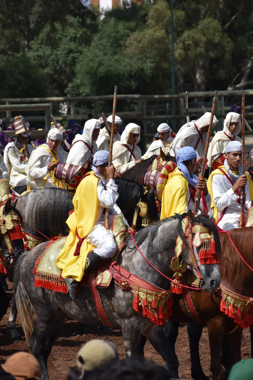 Tbourida fantasia print — Moroccan horsemen charging through gunpowder smoke (BWK-474), photograph by Saida