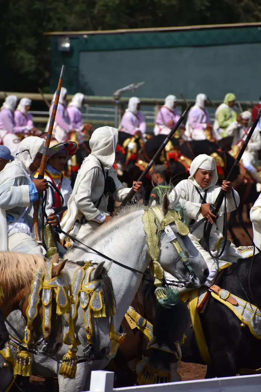 Tbourida fantasia print — Moroccan horsemen charging through gunpowder smoke (BWK-502), photograph by Saida
