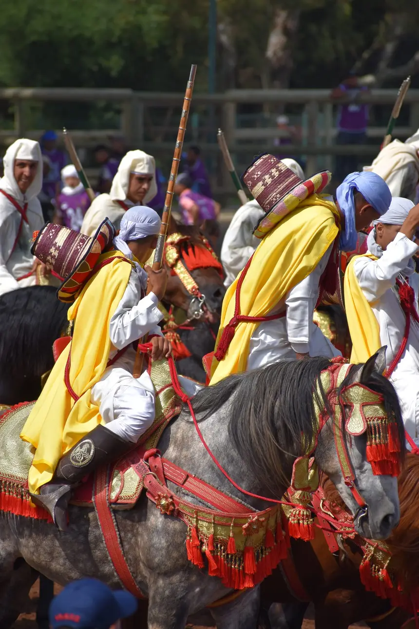 Tbourida fantasia print — Moroccan horsemen charging through gunpowder smoke (BWK-505), photograph by Saida