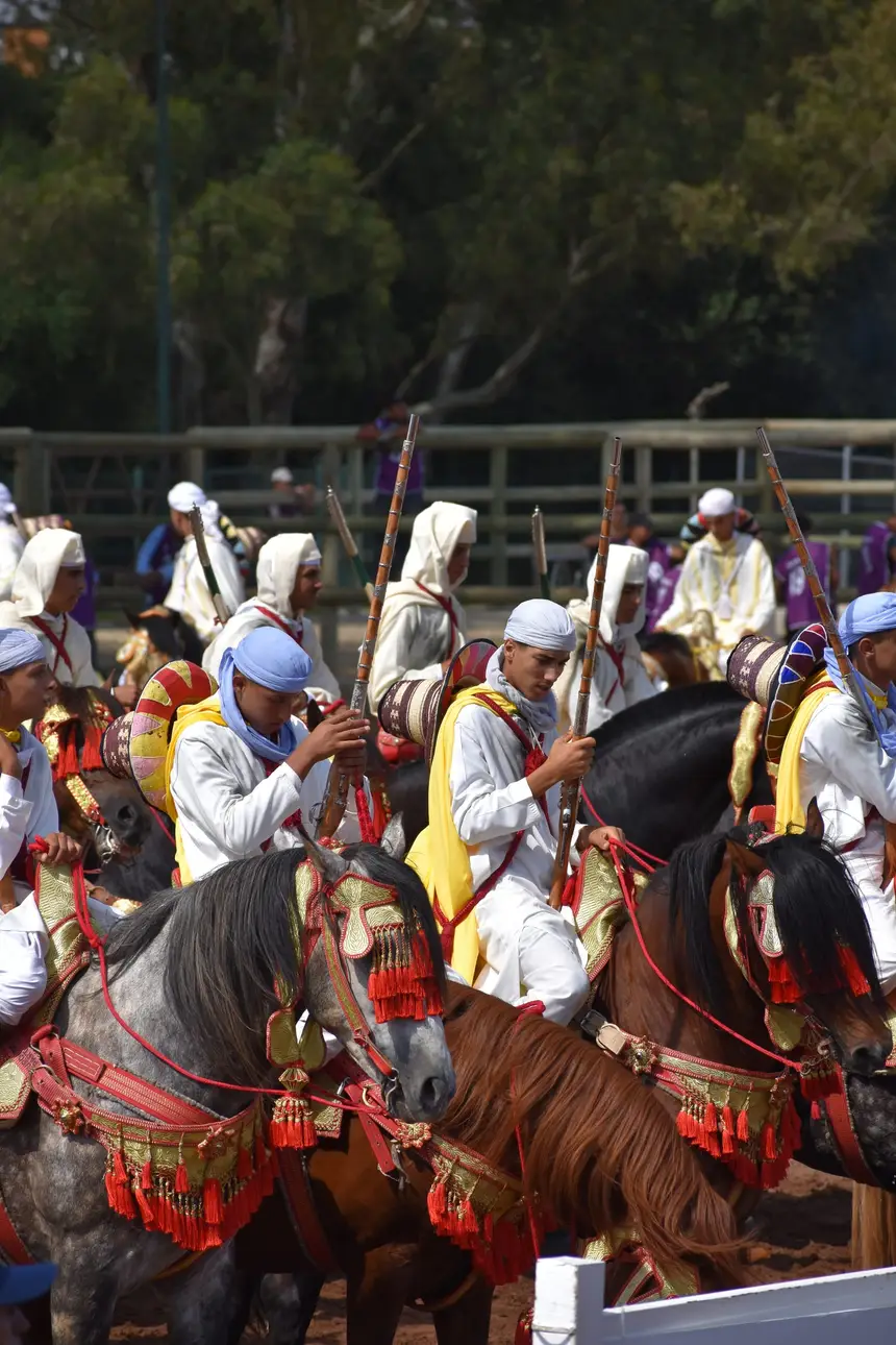 Tbourida fantasia print — Moroccan horsemen charging through gunpowder smoke (BWK-507), photograph by Saida