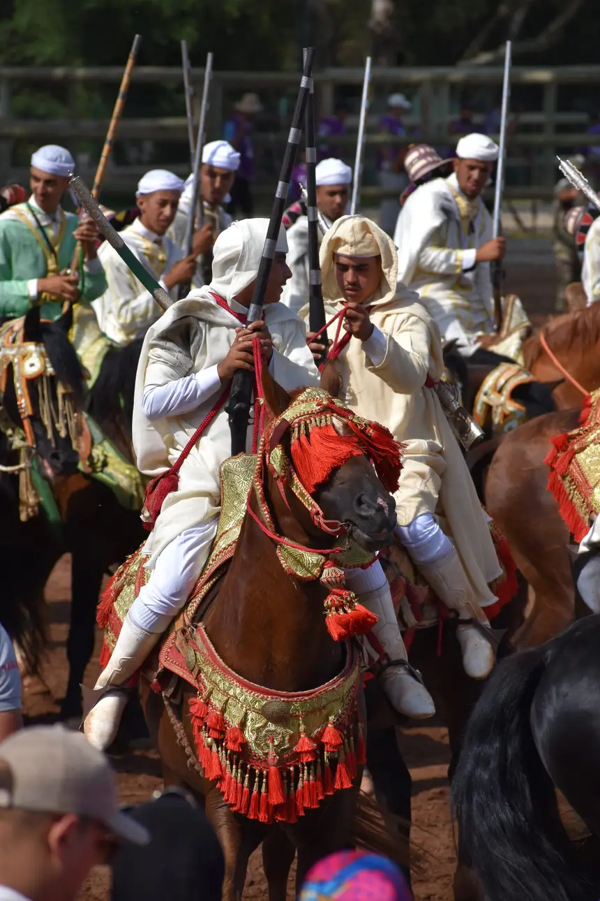 Tbourida fantasia print — Moroccan horsemen charging through gunpowder smoke (BWK-560), photograph by Saida