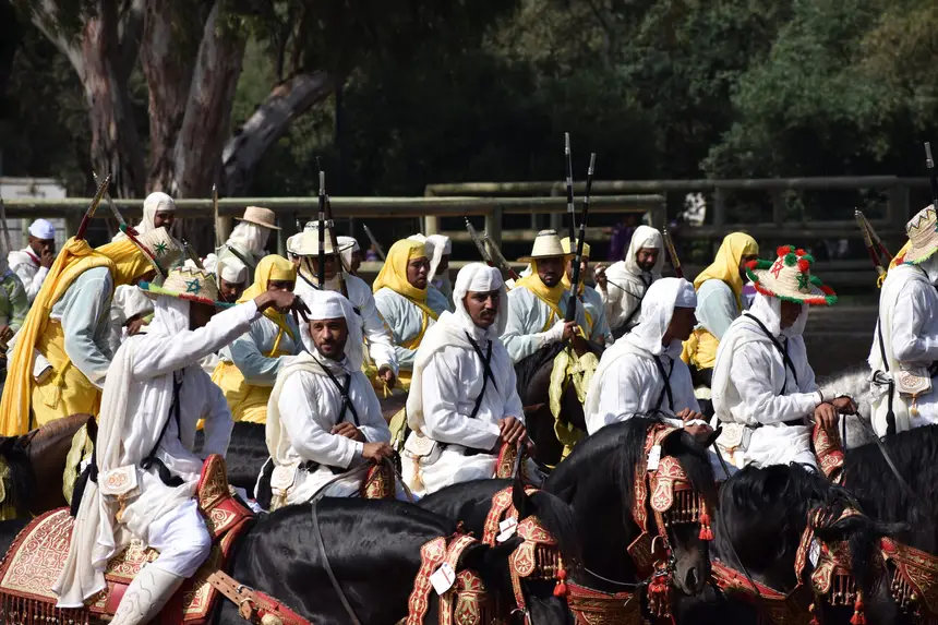 Tbourida fantasia print — Moroccan horsemen charging through gunpowder smoke (BWK-589), photograph by Saida