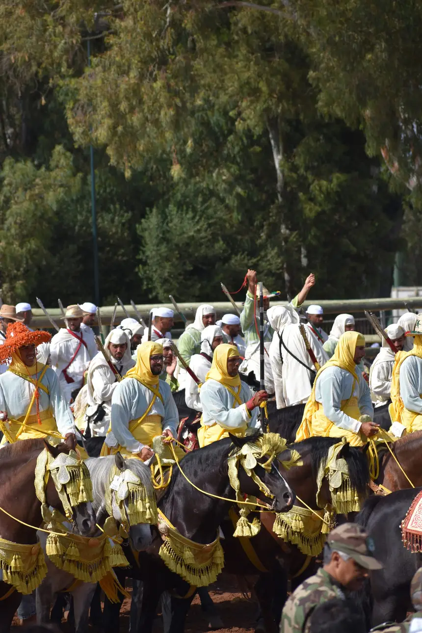 Tbourida fantasia print — Moroccan horsemen charging through gunpowder smoke (BWK-598), photograph by Saida