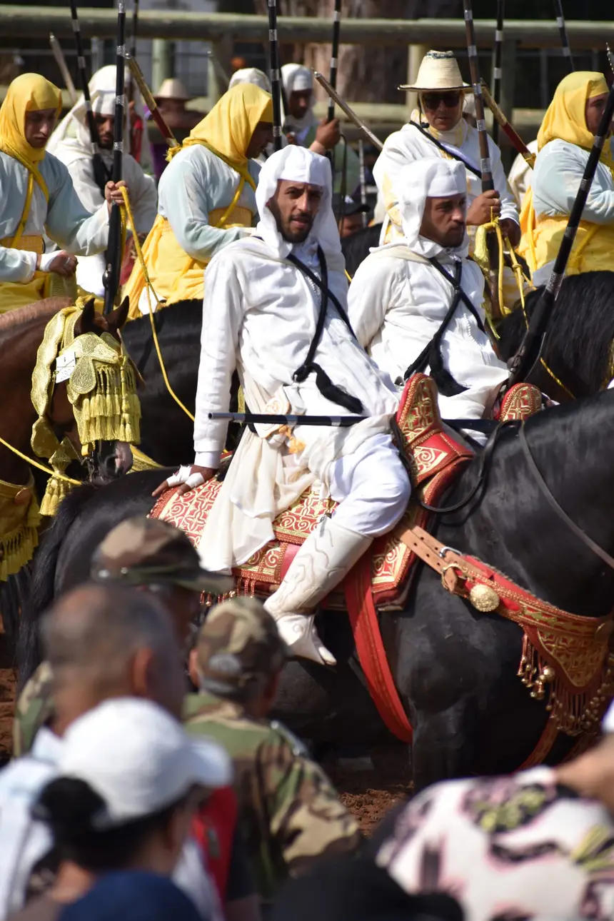 Tbourida fantasia print — Moroccan horsemen charging through gunpowder smoke (BWK-607), photograph by Saida