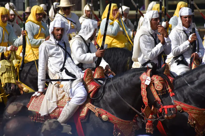 Tbourida fantasia print — Moroccan horsemen charging through gunpowder smoke (BWK-608), photograph by Saida
