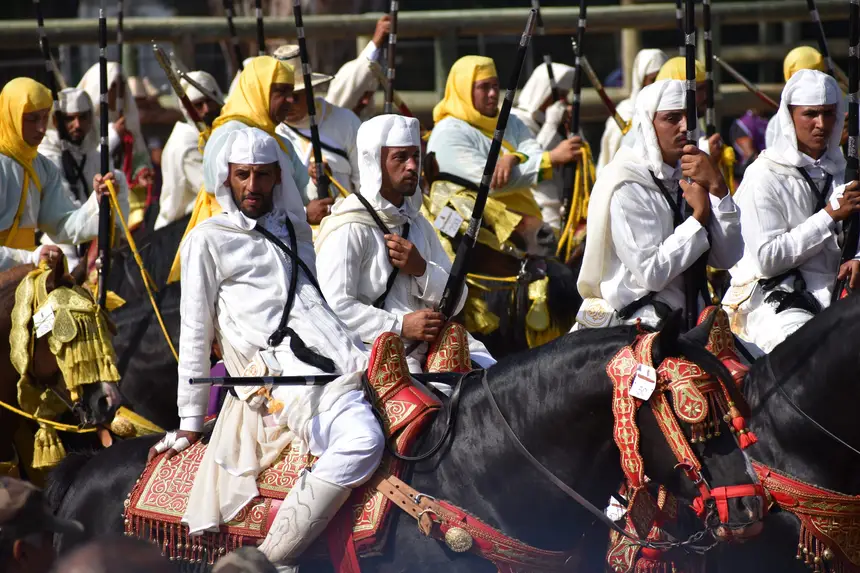 Tbourida fantasia print — Moroccan horsemen charging through gunpowder smoke (BWK-610), photograph by Saida